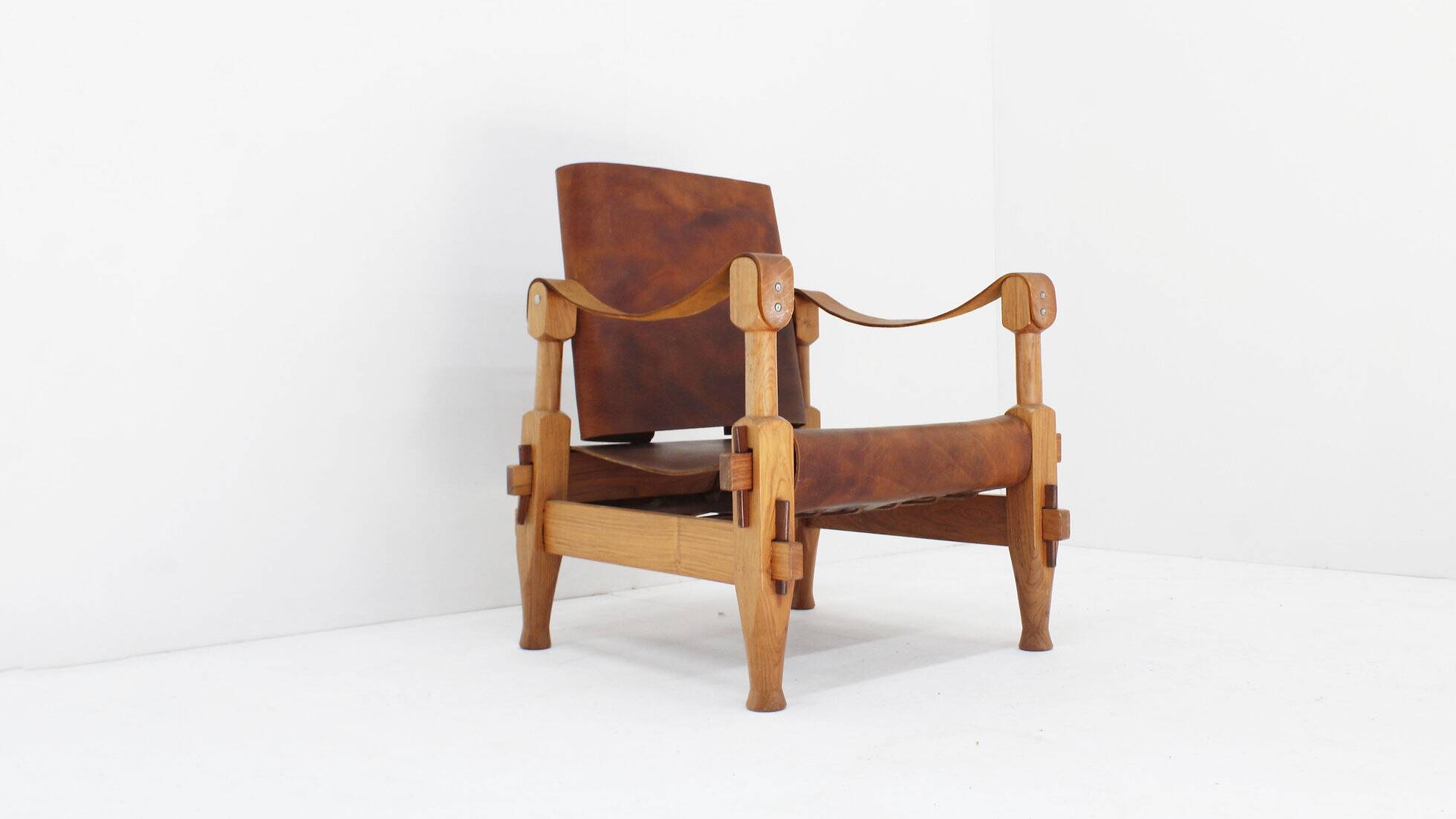 Vintage brutalist wood and cognac leather safari armchair, 1960s