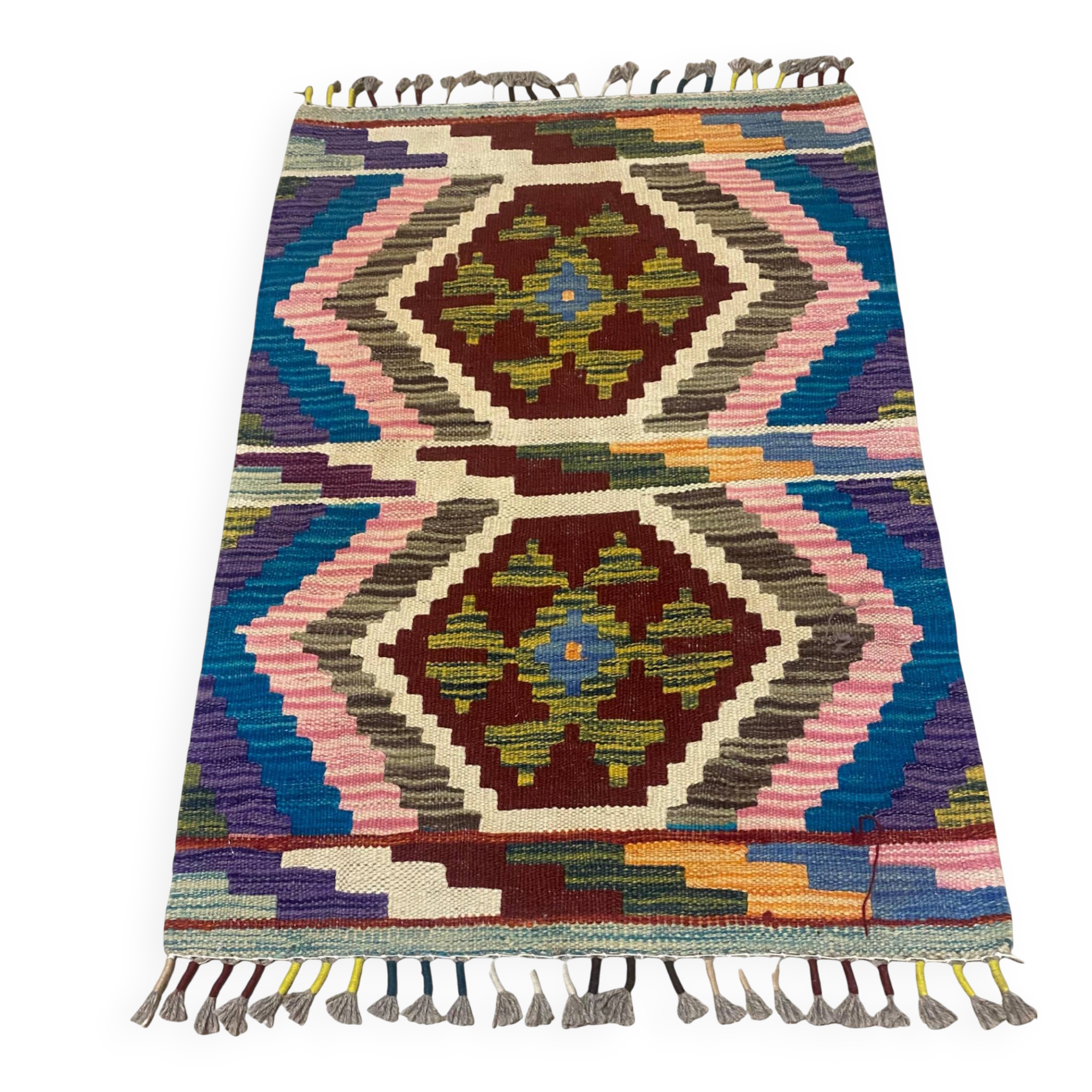 Afghan kilim rug in wool, pastel geometric patterns,
