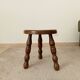 Tabouret tripode vintage en bois tourné