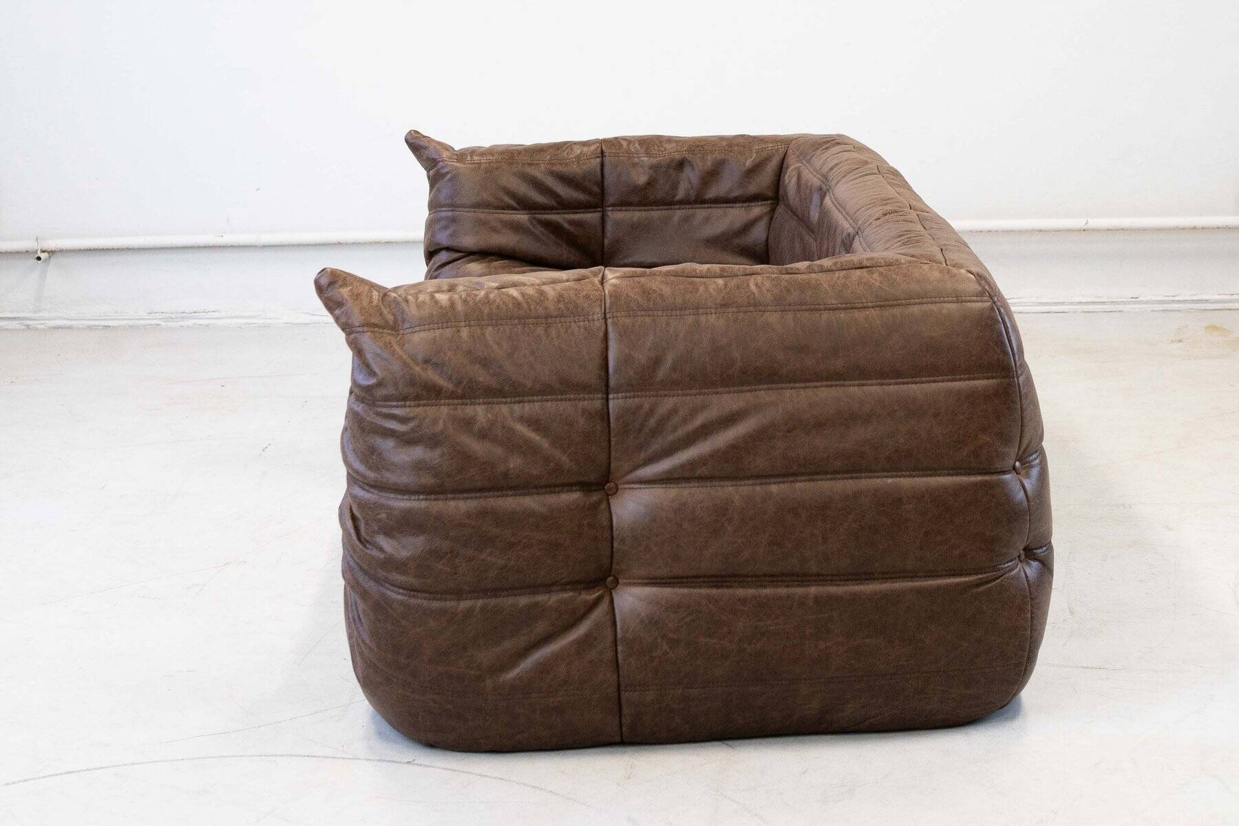 Vintage two-seater Togo sofa with arms in brown leather by Michel Ducaroy for Ligne Roset, 1970s