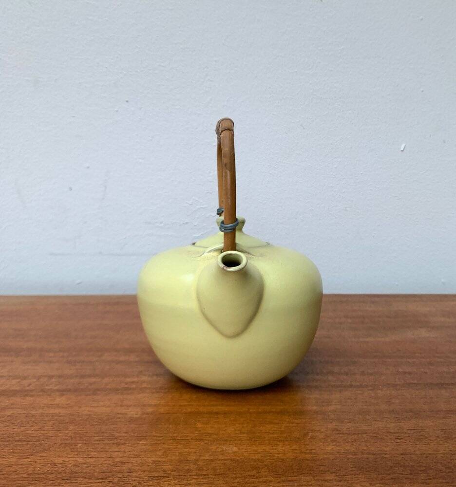Mid-century ceramic teapot with bamboo handle, 1960s.