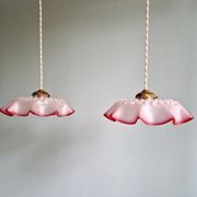 Pair of clear and pink satin glass scalloped pendant lights, 1920s-30s