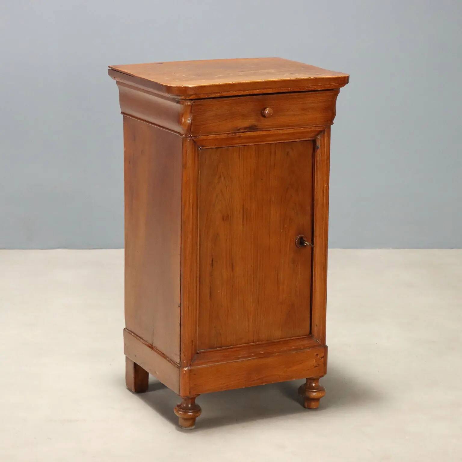 Antique Louis-Philippe bedside table in walnut with drawer, Italy, 19th century.