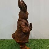Rabbit with a cast iron pipe garden statue