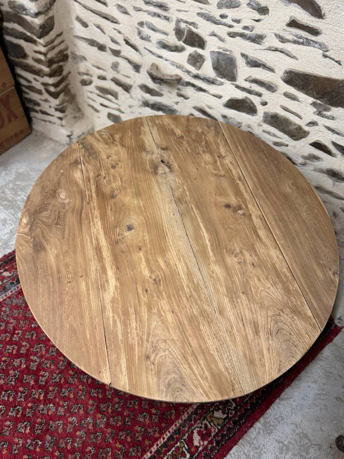 Oval coffee table in raw wood