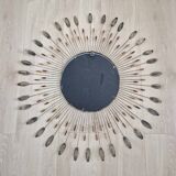 Vintage metal sun mirror in the style of Line Vautrin