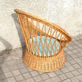 Vintage basket armchair in woven rattan - round seat Design 1960-1970