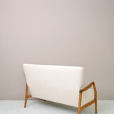 Vintage Scandinavian sofa with faux lambskin