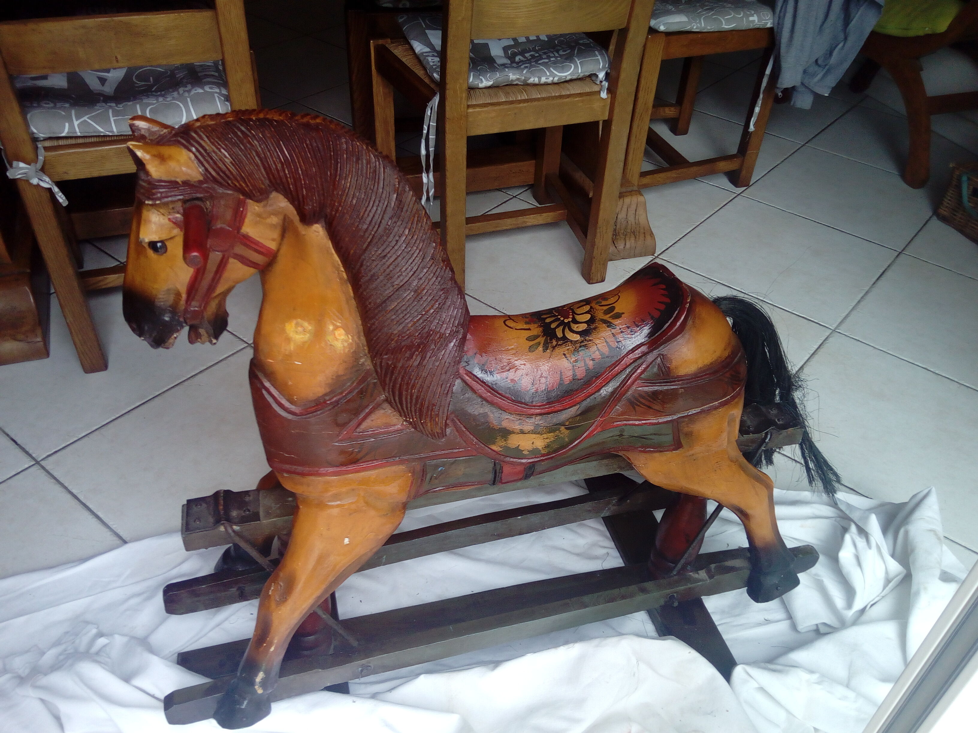 Horse rocks children wood and iron