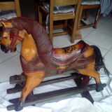 Horse rocks children wood and iron