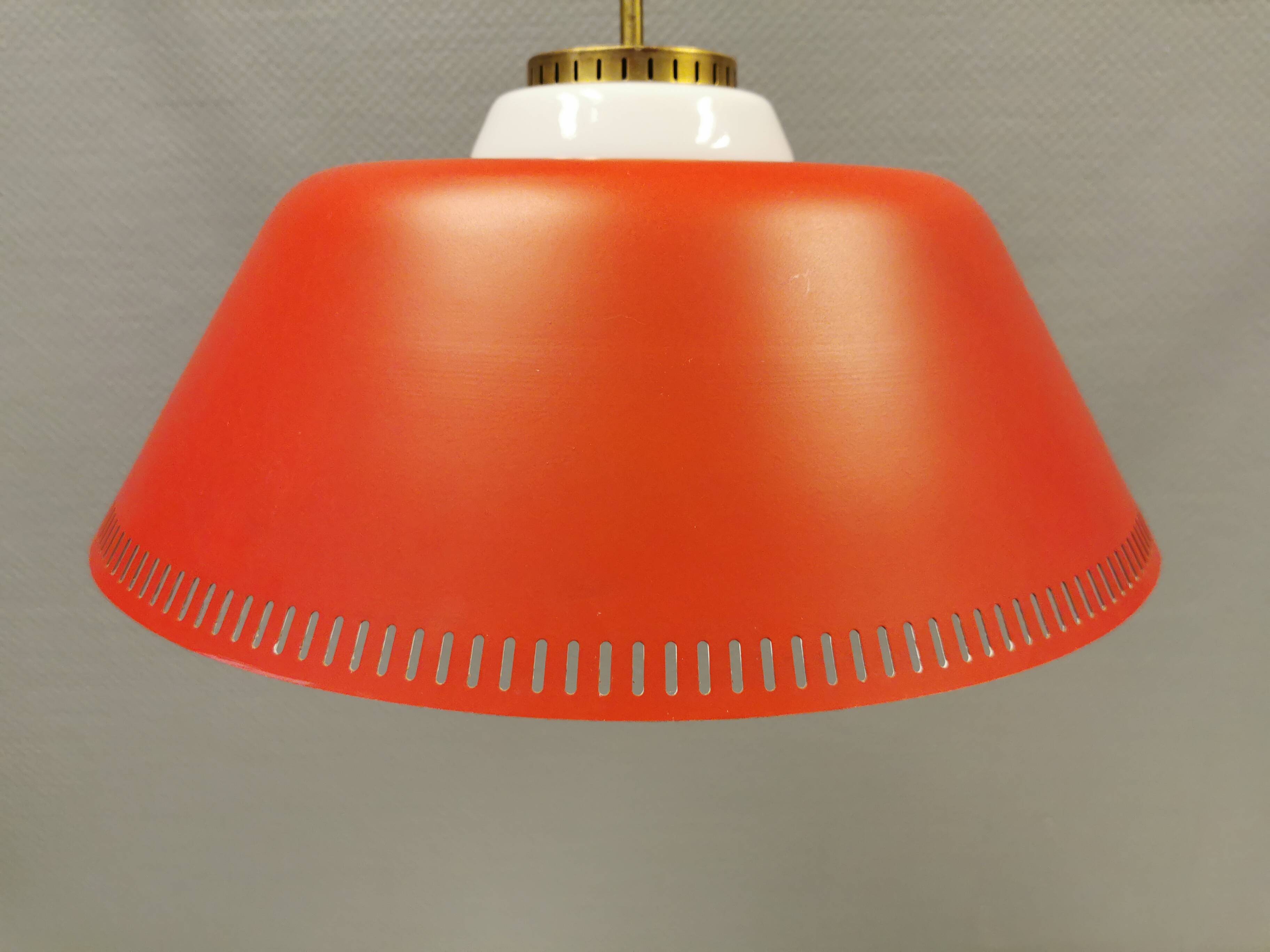Hanging lamp in red lacquered metal and milky white opal glass 1970s Denmark.