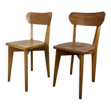Pair of Luterma bistro chairs, wood, 1950s
