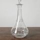 Antique crystal liqueur decanter with engraved monogram and flat ribs