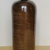 Old sandstone bottle