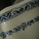 Saucière in Gien earthenware anse in the shape of a dolphin decoration garland 1900