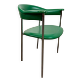 Vintage chrome chair with green faux leather upholstery.