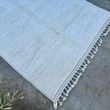 Simple white handmade rug 250cm x 150cm