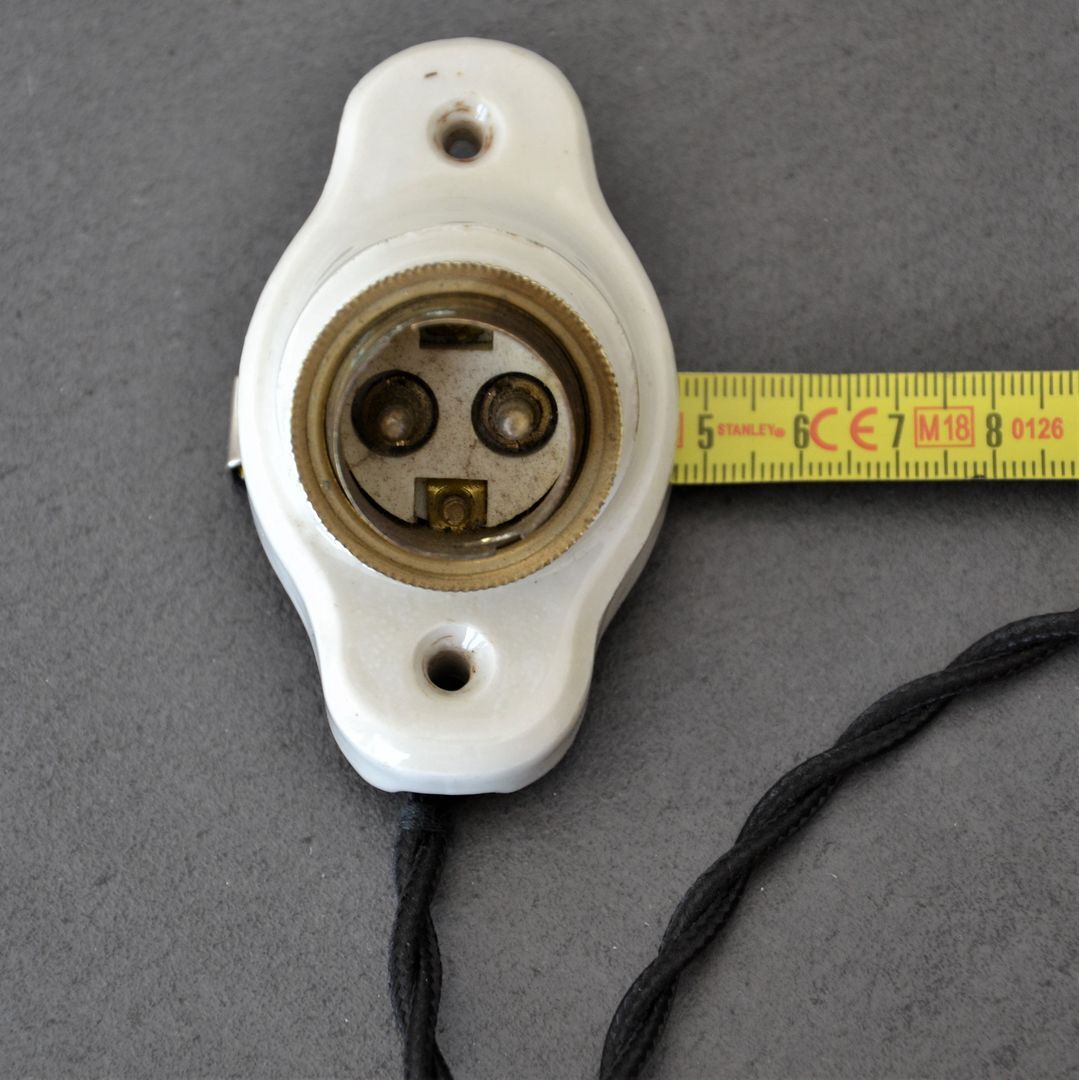 Oval porcelain hook to plug into socket