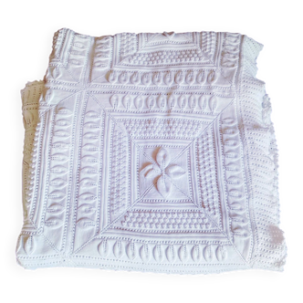 Knitted white cotton bedspread