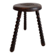 Brutalist tripod stool with twisted legs