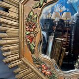 Large wooden mirror with golden sunbeams, Art Deco style.