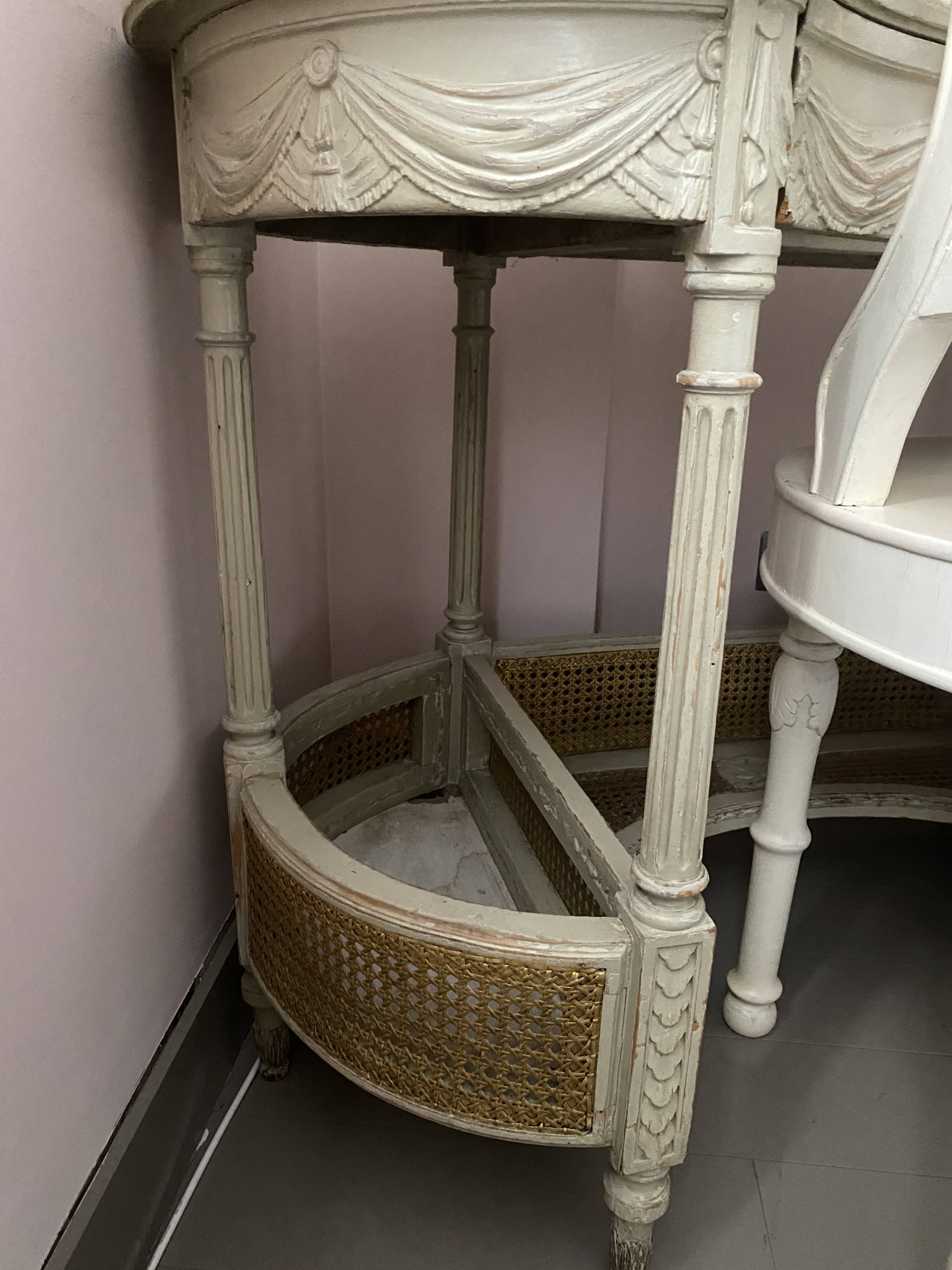 Hairdresser and her cane chair in Louis XVI style.