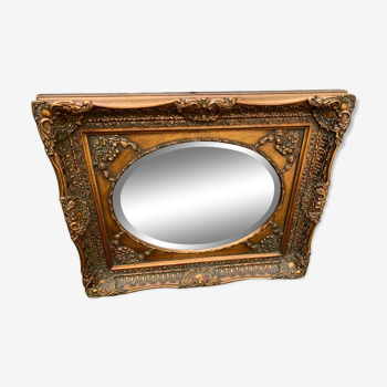 Mirror in gilded and carved wood early 20th