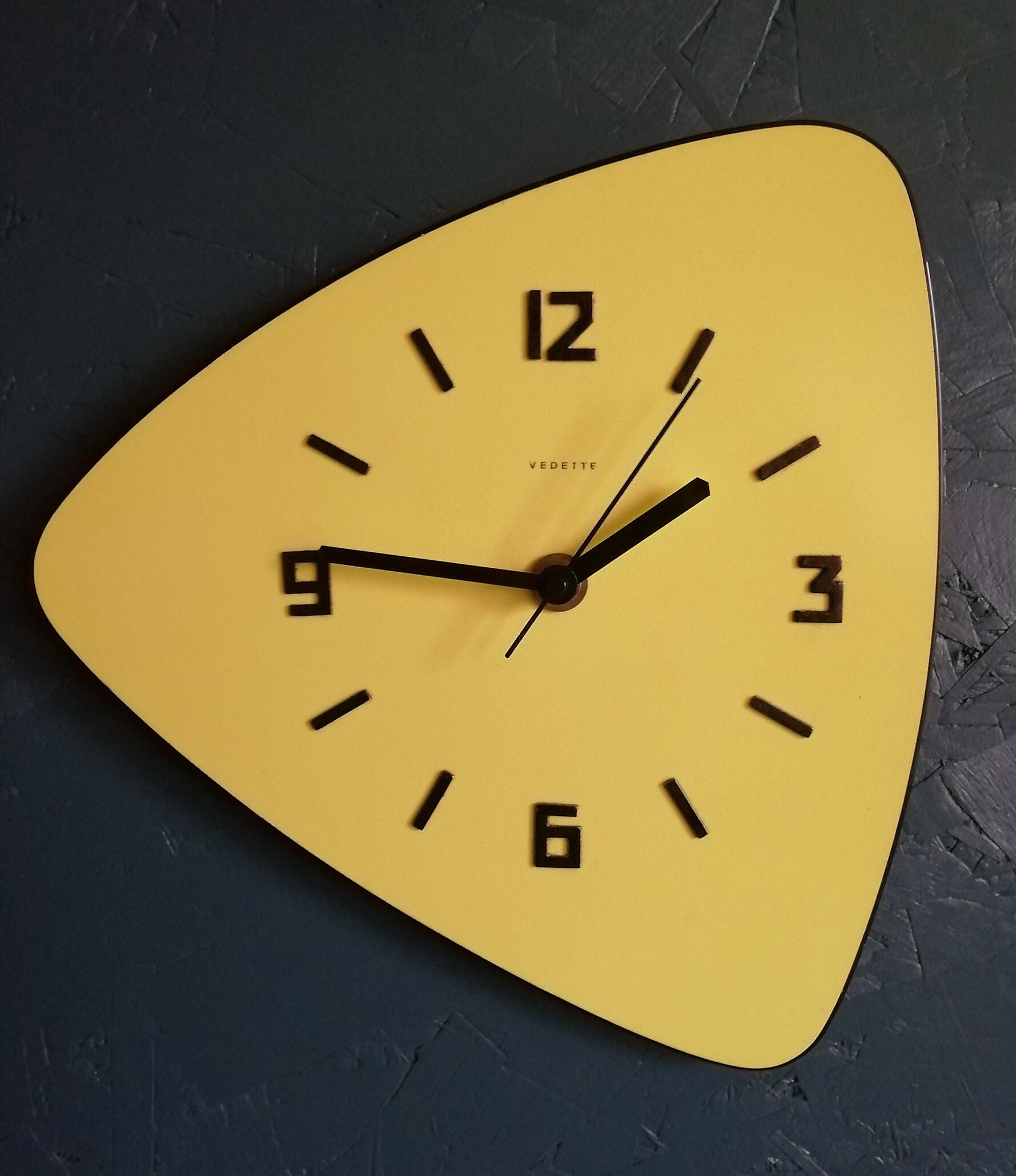 Formica vintage asymmetrical silent wall clock "Yellow Star"