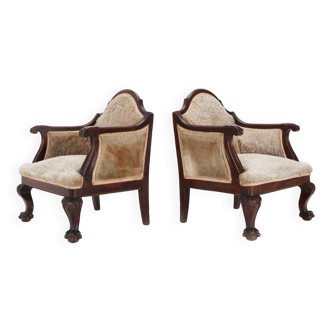 Ensemble de fauteuils en acajou massif et peau de mouton du début de l'Empire, années 1820