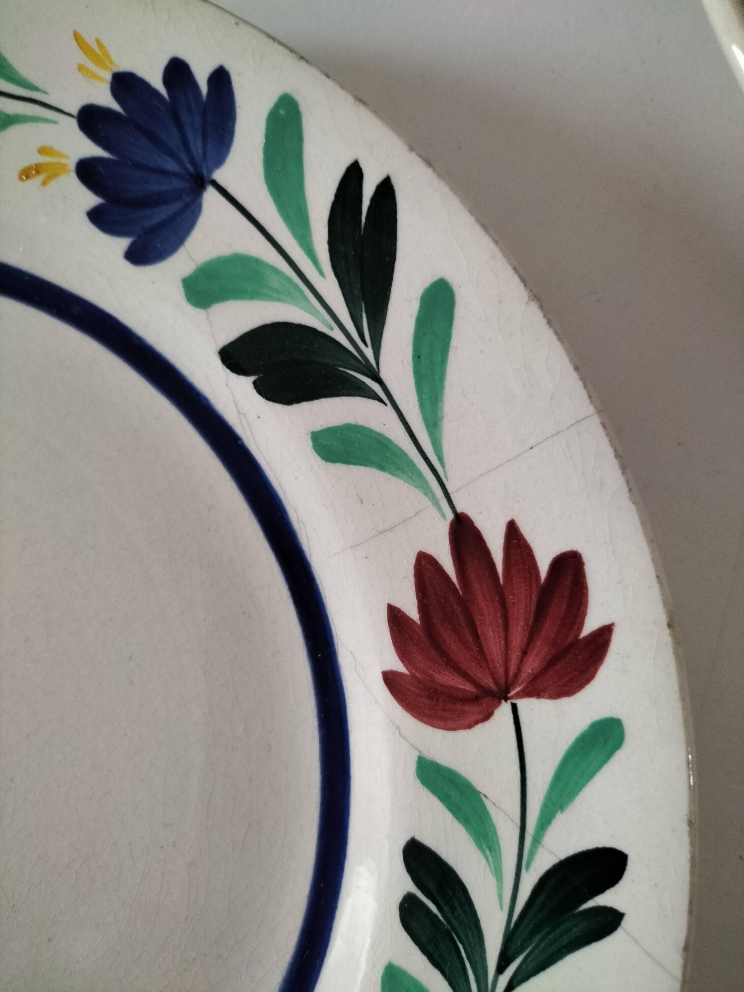 4 Longchamp plates with stylised floral decoration from the 1930s-50s.