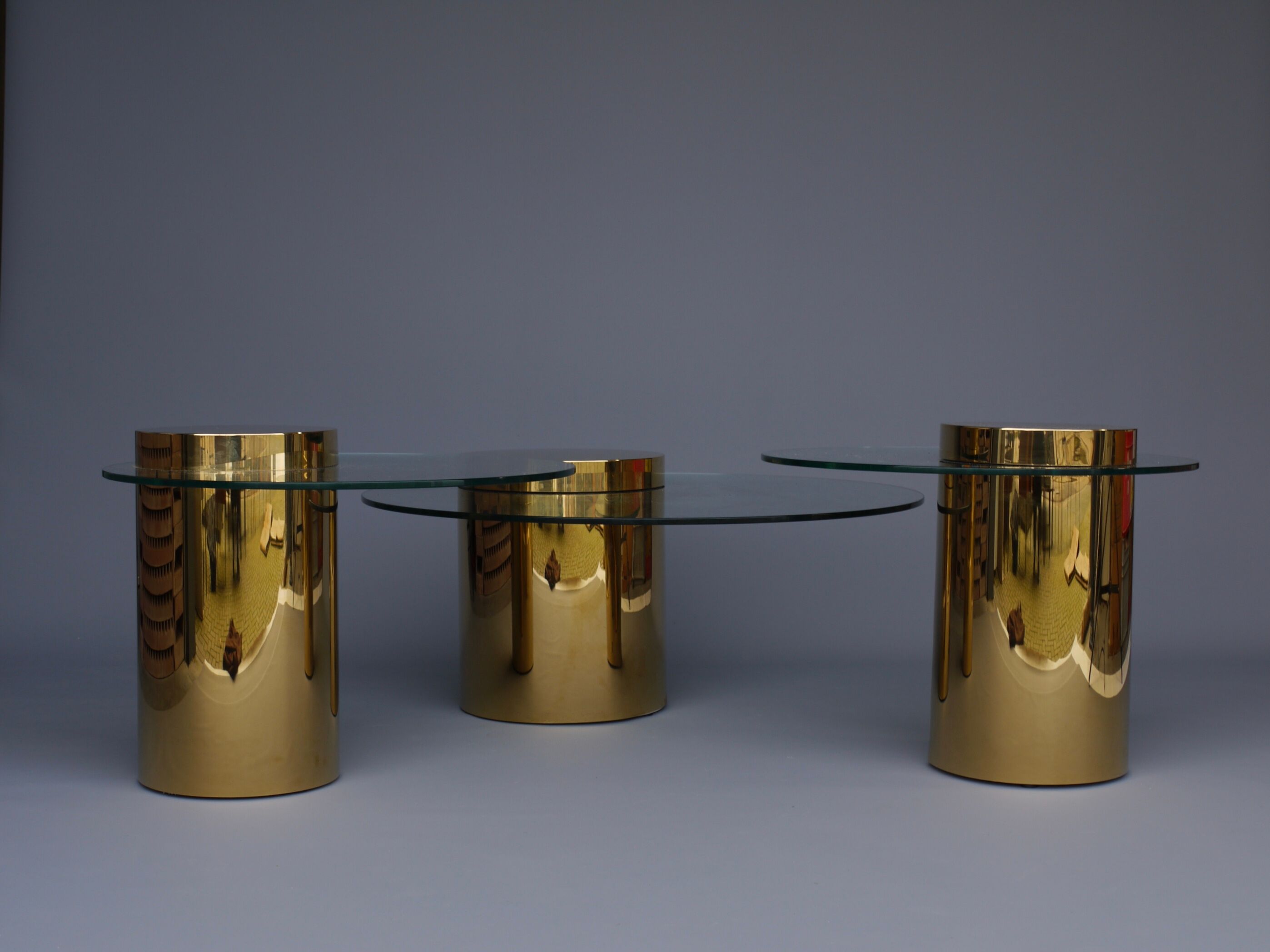 Polished Brass and Glass Low Tables. 2000s. Set of 3