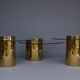 Polished Brass and Glass Low Tables. 2000s. Set of 3