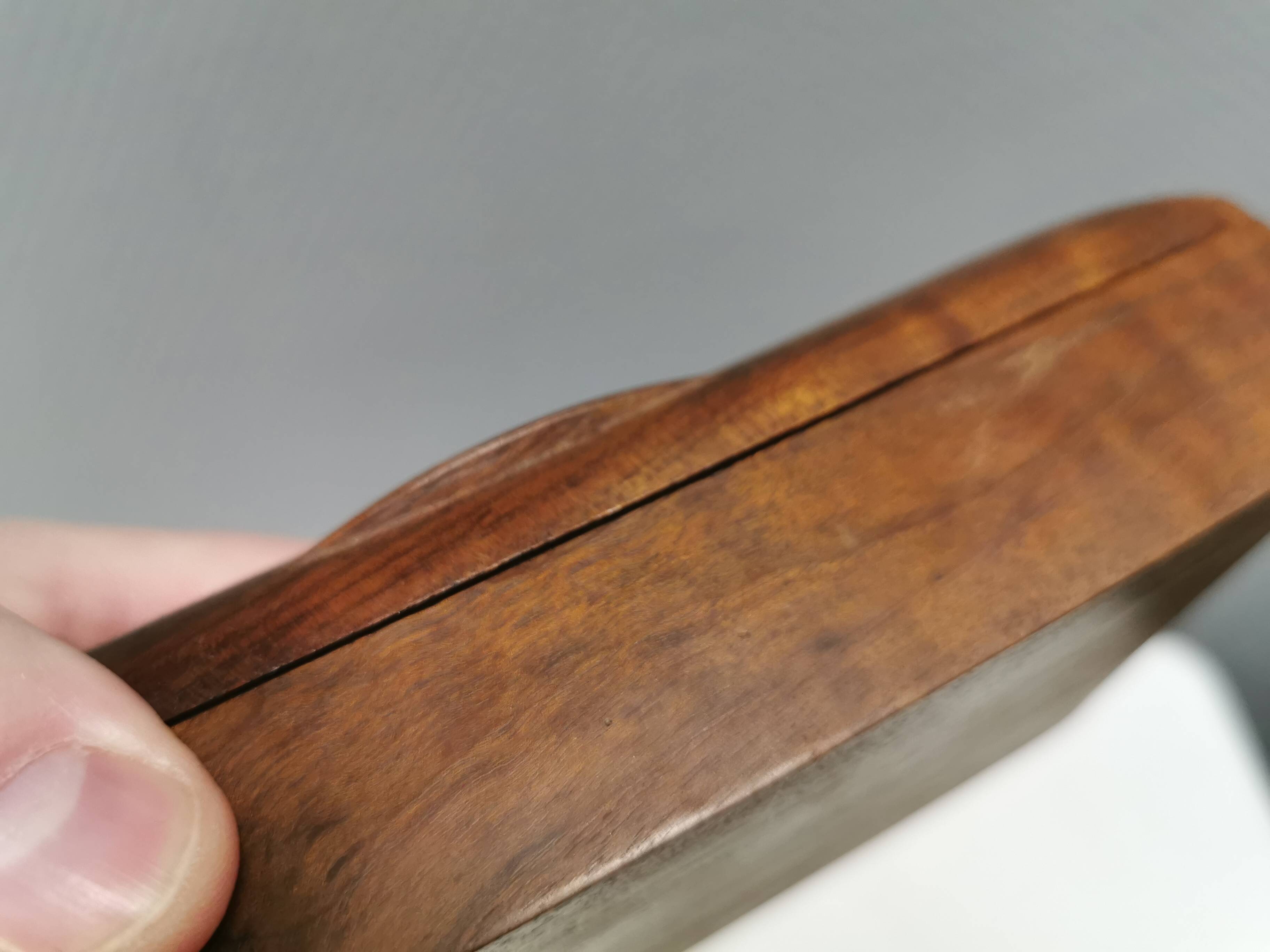 Wooden trinket box for storing jewellery, cigarettes or similar items.
