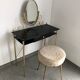Brass hairdresser, glass and black plastic with its fluffy stool.