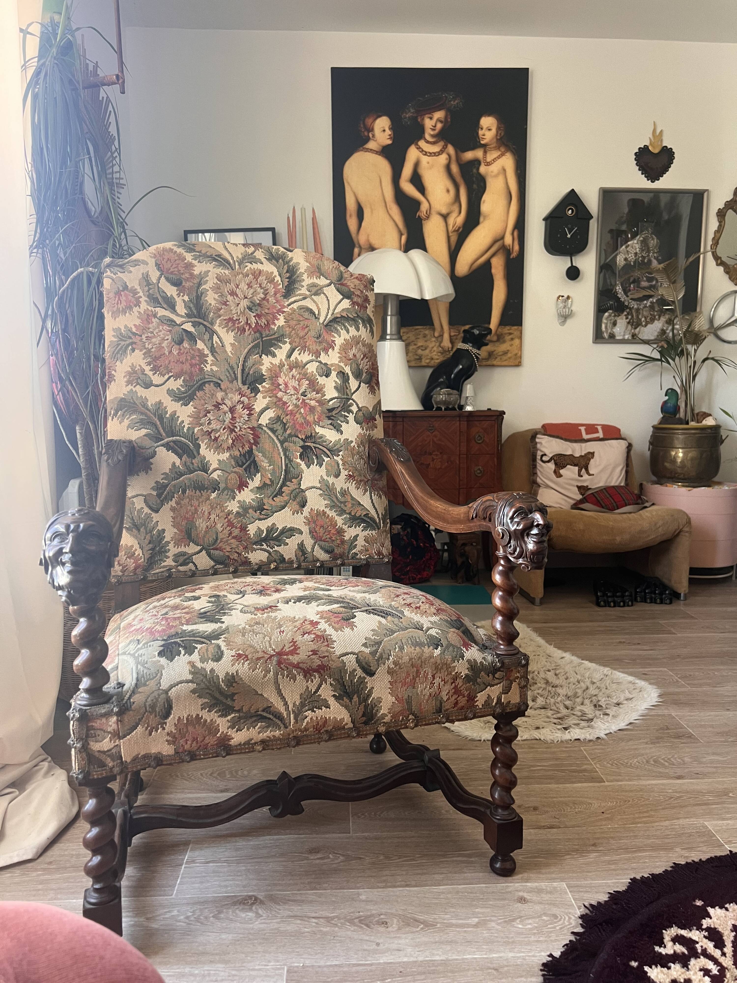 Antique armchair in Henri II style with masks