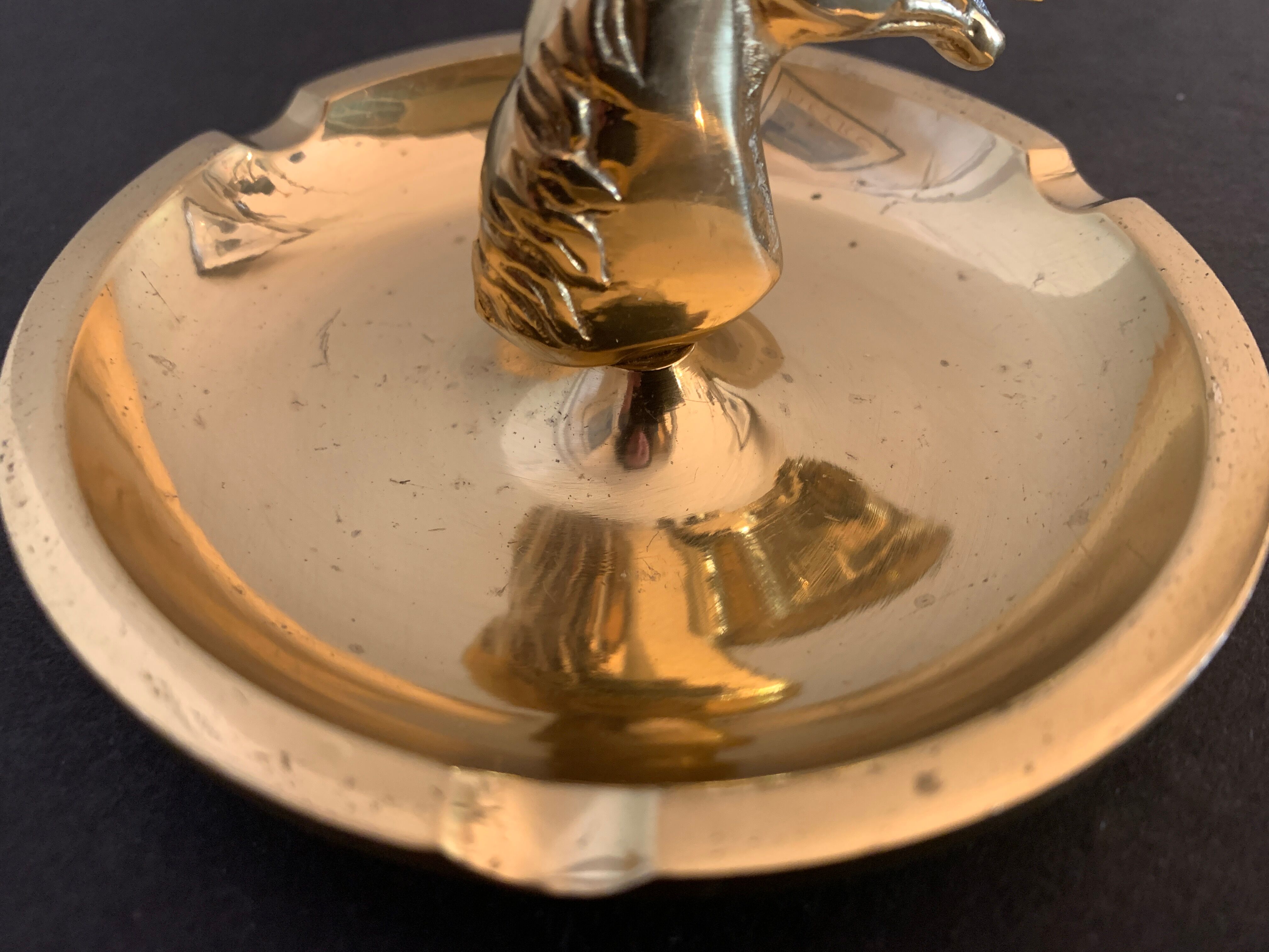 Horse-headed brass ashtray