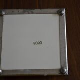 Numbered art deco table mat