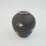 Small black ceramic vase with abstract fish and wave pattern