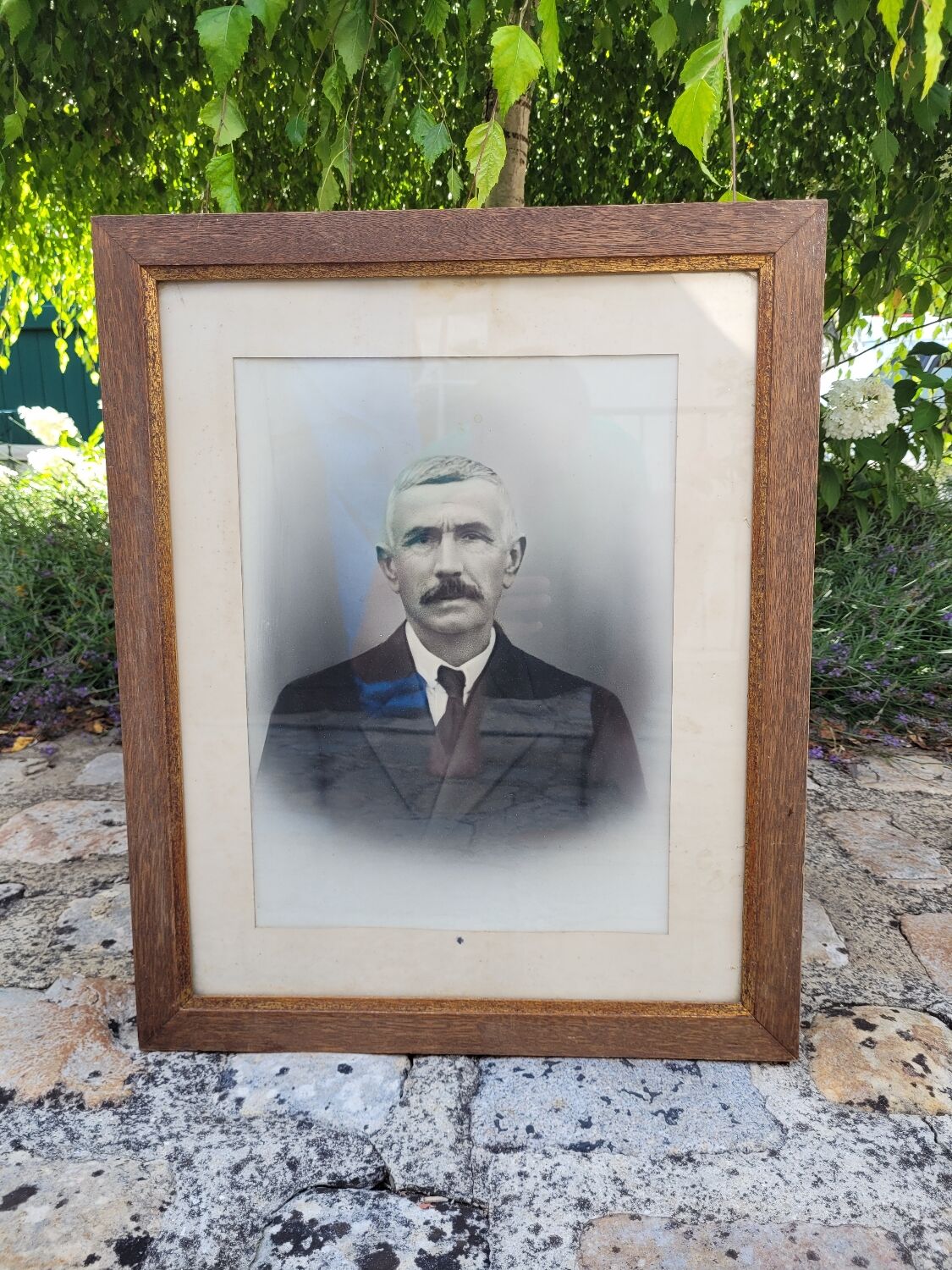 Framed portrait of a man.