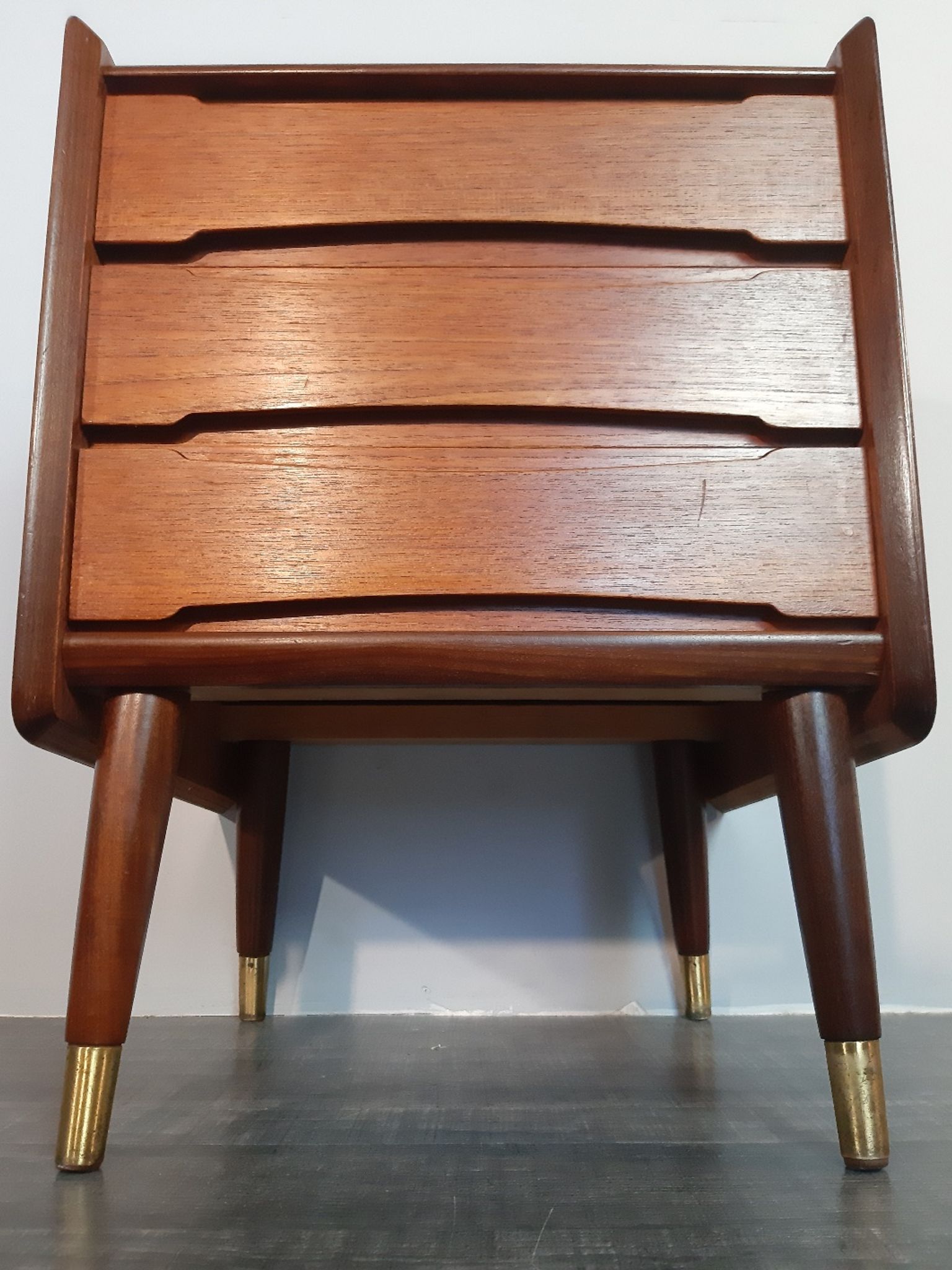 Norwegian bedside table with 3 drawers, teak and brass clogs