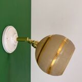 Vintage globe wall light in frosted yellow and gold glass.