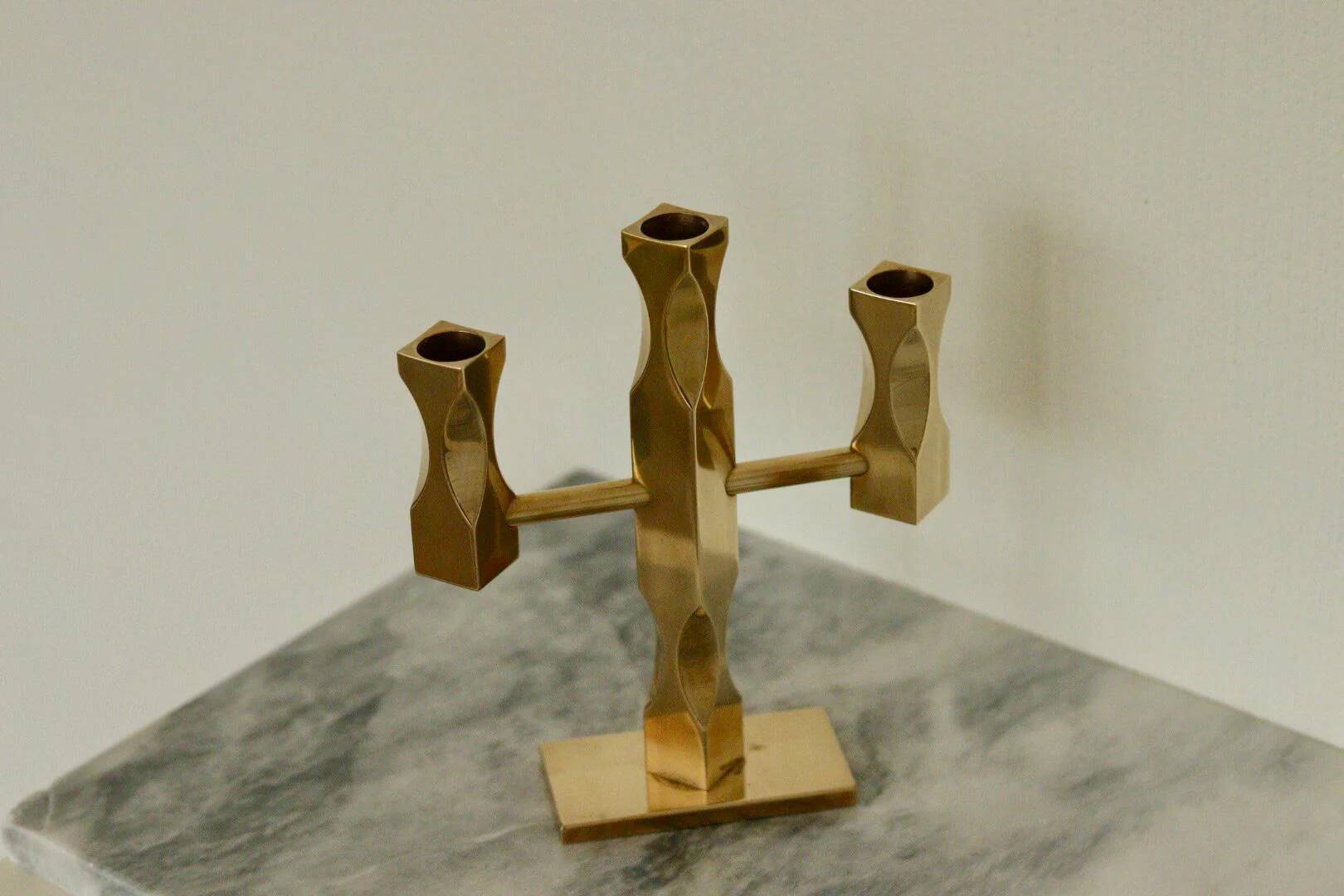 Swedish three-armed candelabrum in brass by Lars Åkesson for Vallonmässing