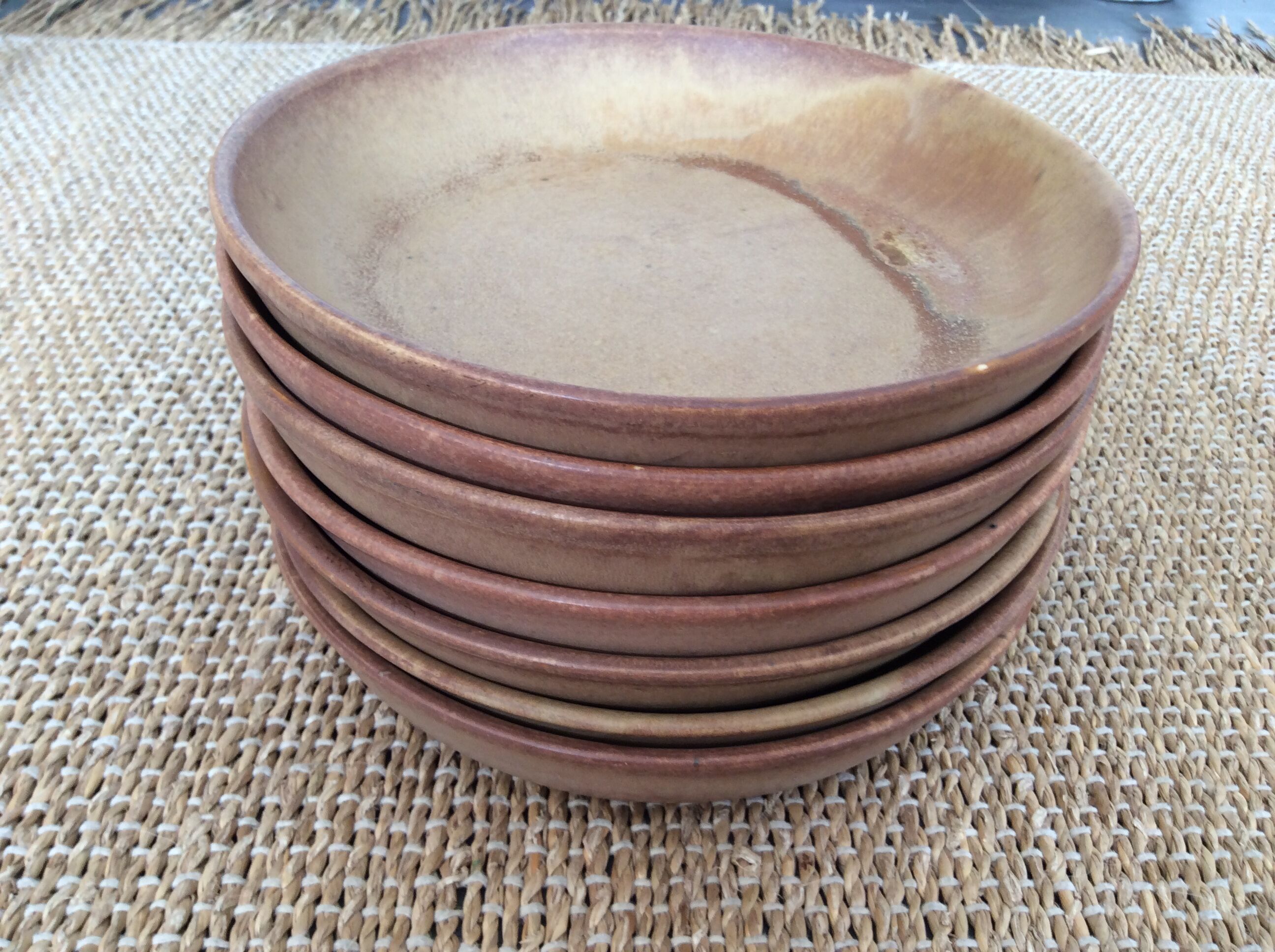 7 hollow stoneware plates