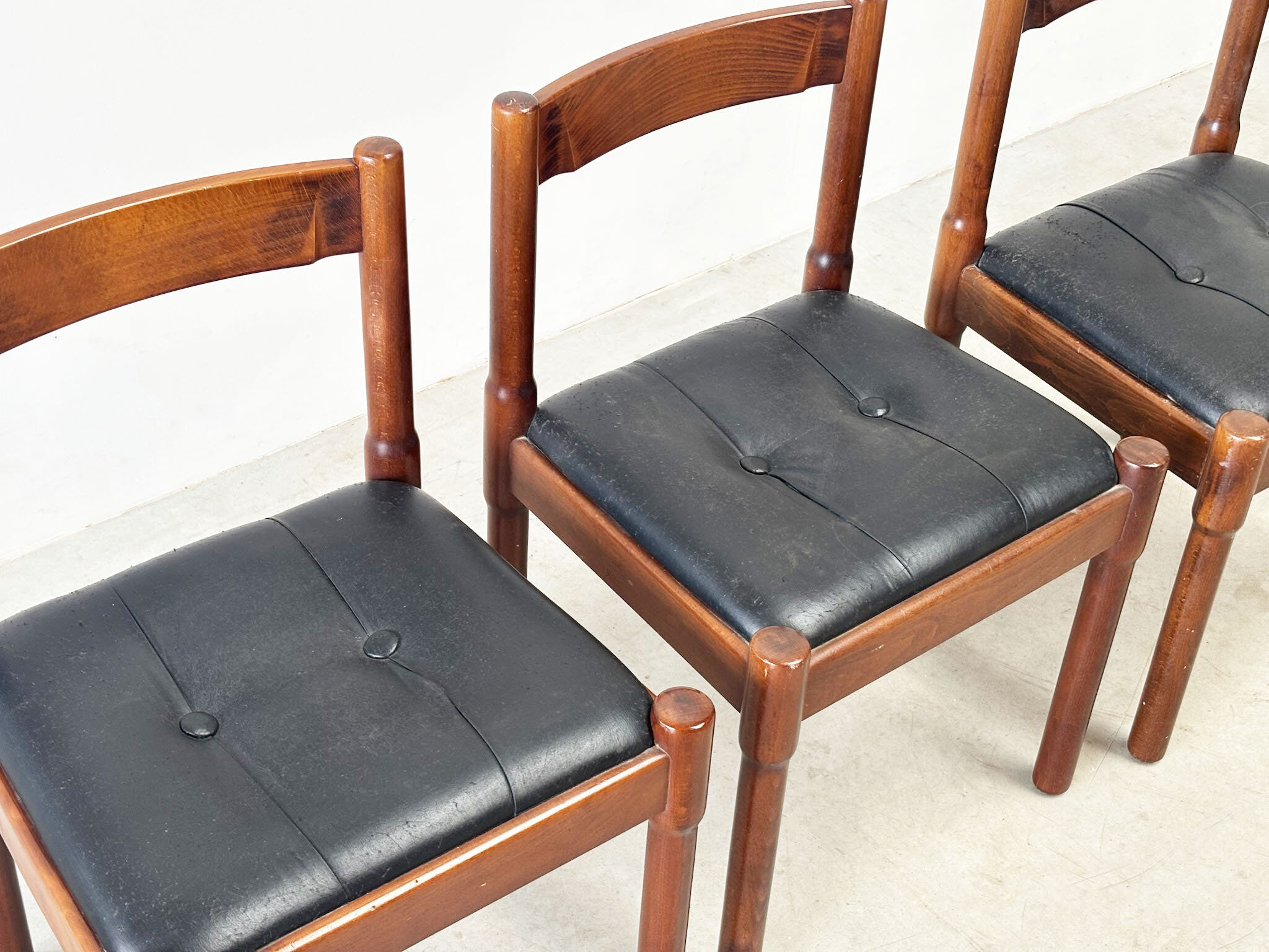 Set of six leather "Carimate" dining chairs by Vico Magistretti for Cassina