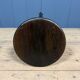 Unmarked black Rowac stool with a dark wood seat.