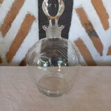 Round carafe in chiseled glass