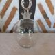 Round carafe in chiseled glass