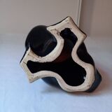 Duck statuette in black ceramic.