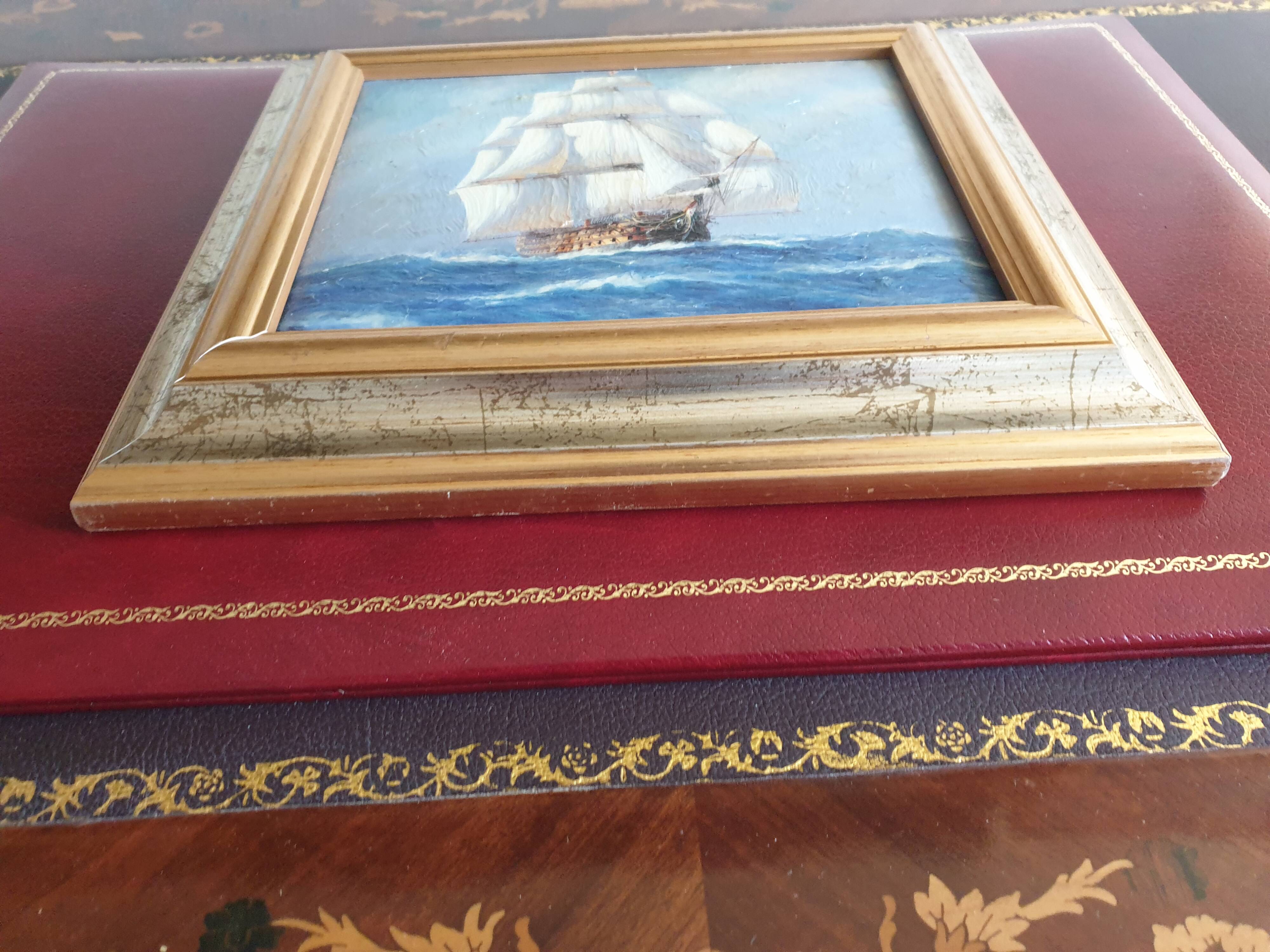 Set of two paintings with identical gold and silver frames
