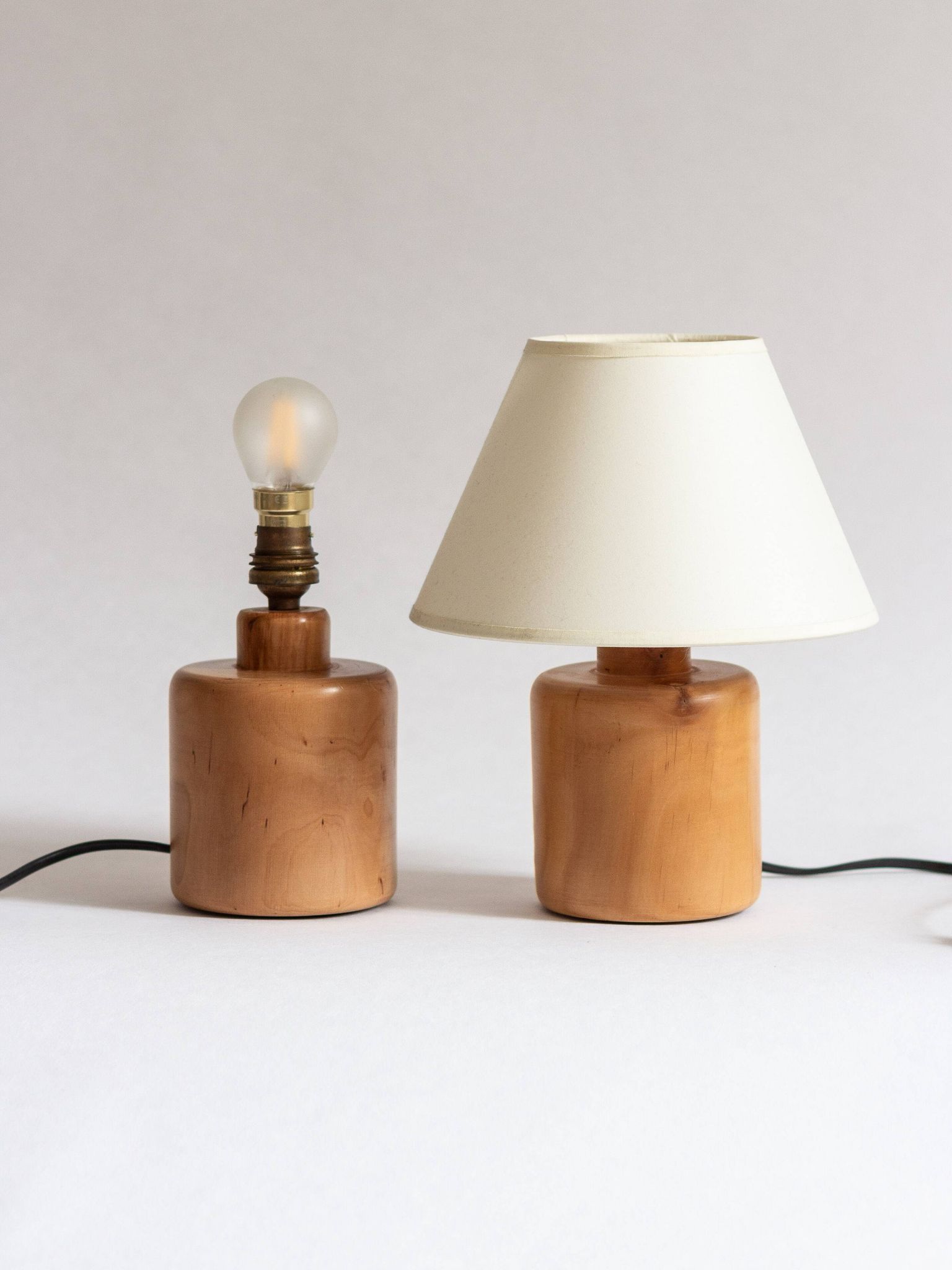 Pair of light wood table or bedside lamp bases, 1970s